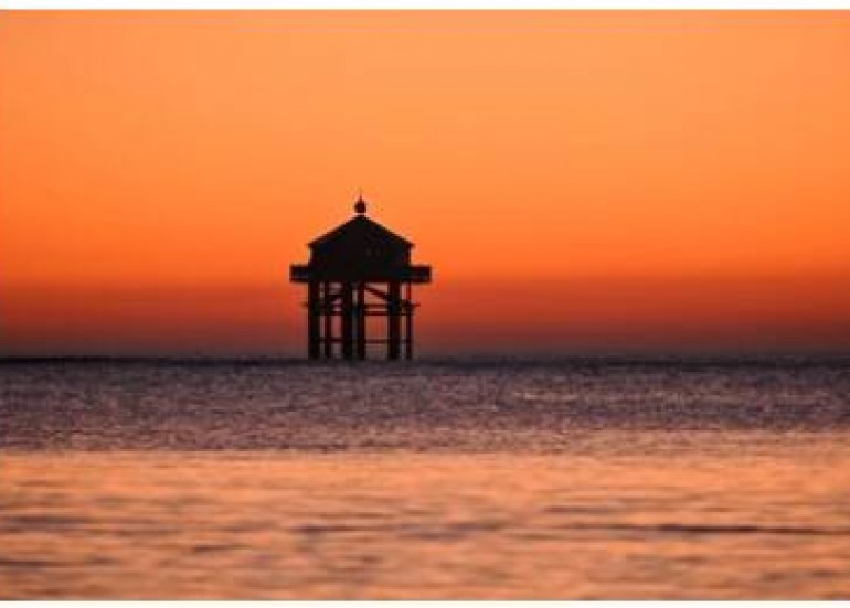 Phare du bout du monde au coucher du soleil